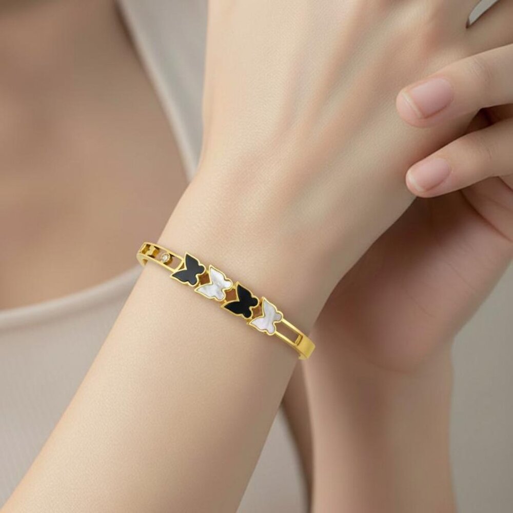 Exquisite Geometric Black and White Butterfly-Accented Stainless Steel Bracelet